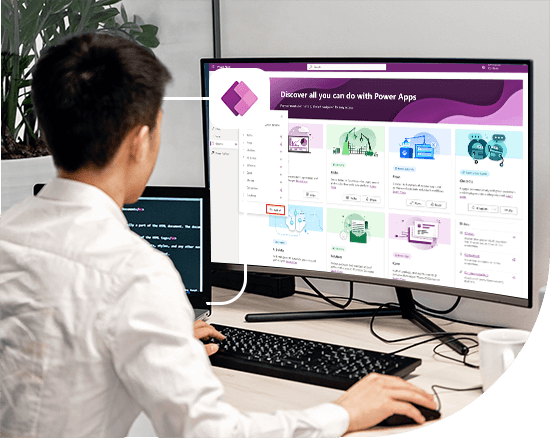 Developer building a custom application using Microsoft Power Apps through a low-code interface to support business operations